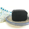 ABOUT FACE Activated Charcoal Organic Facial Soap Bar with a Cedar Essential Oil Blend.